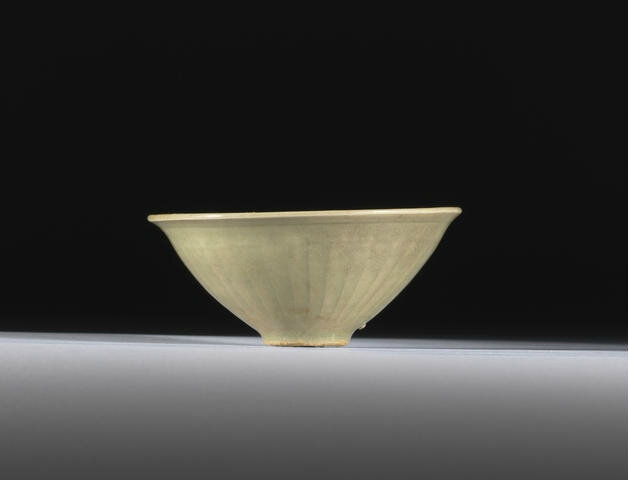 A small Yaozhou celadon carved 'chrysanthemum' bowl, Song Dynasty