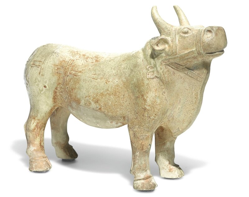 A straw-glazed pottery model of an ox, Tang Dynasty (618-907)