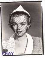 1951-04-12-LoveNest-test_hat-mm-010-1