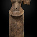 A sandstone figure of a <b>female</b> deity, possibly Durga, Cambodia, Angkor Period, Koh Ker style, 10th century