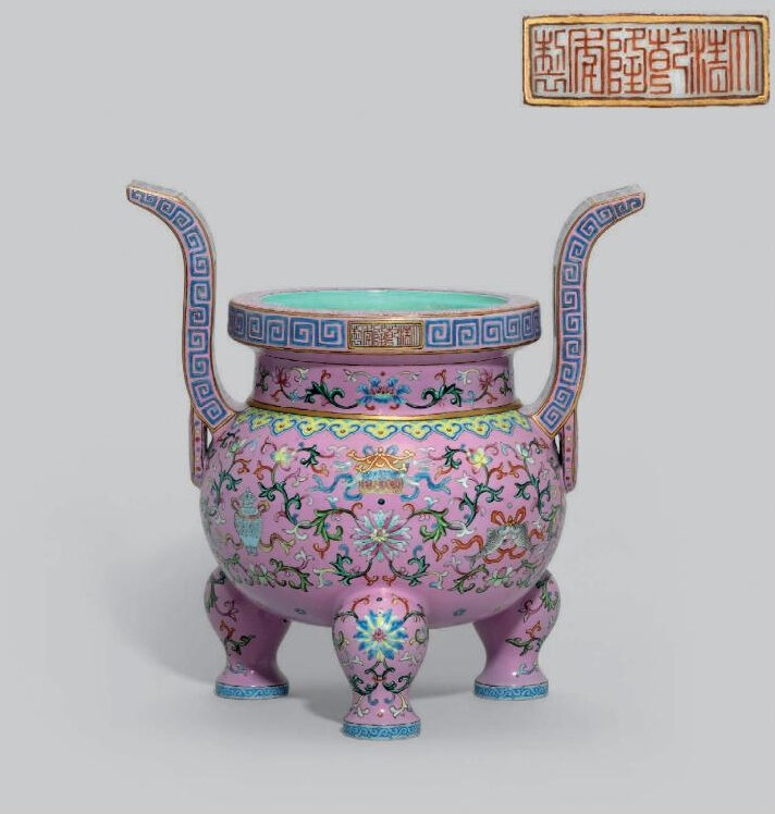 A pink-ground famille-rose 'bajixiang' tripod censer, Qianlong six-character mark in iron-red and of the period (1736-1795)