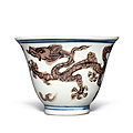 A small aubergine-enameled blue and white 'dragon' cup, Mark and period of <b>Jiajing</b> (1522-1566)