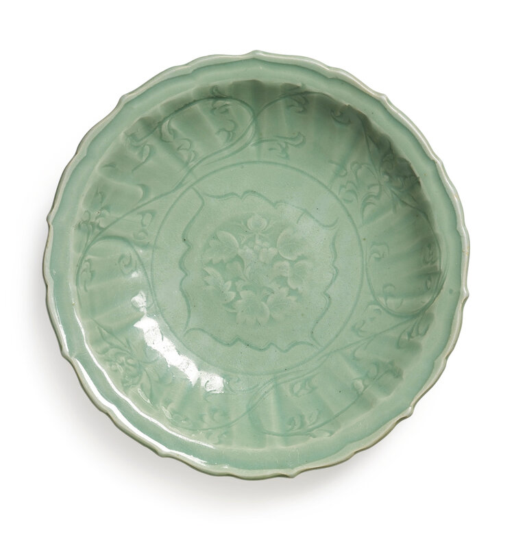 A carved and molded 'Longquan' celadon-glazed dish, Song dynasty (960-1279)
