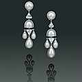 A unique pair of natural pearl and diamond ear pendants, by <b>Etcetera</b> for Paspaley