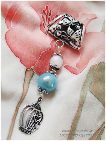 bijou de foulard bleu opaline cage oiseau motif papillon