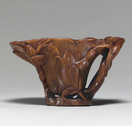 A rhinoceros horn magnolia-form libation cup, 17th century