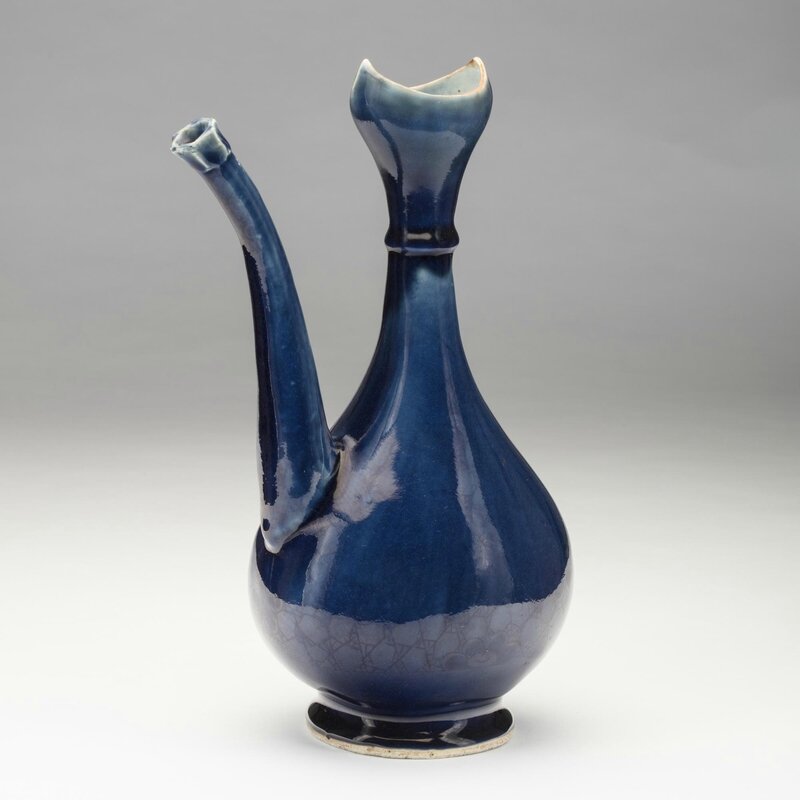 A porcelain blue ewer made for the Islamic market, China, 18th century, 30cm high