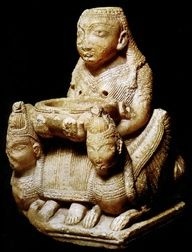 canaanite goddes seated between lions