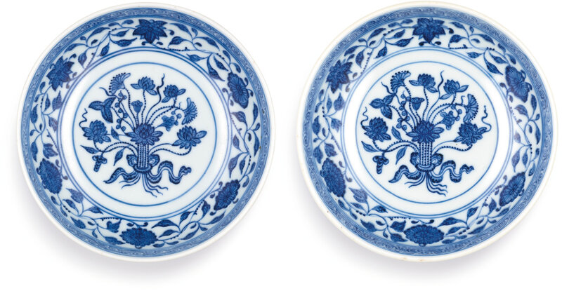 A pair of blue and white 'lotus bouquet' small dishes, seal marks and period of Daoguang