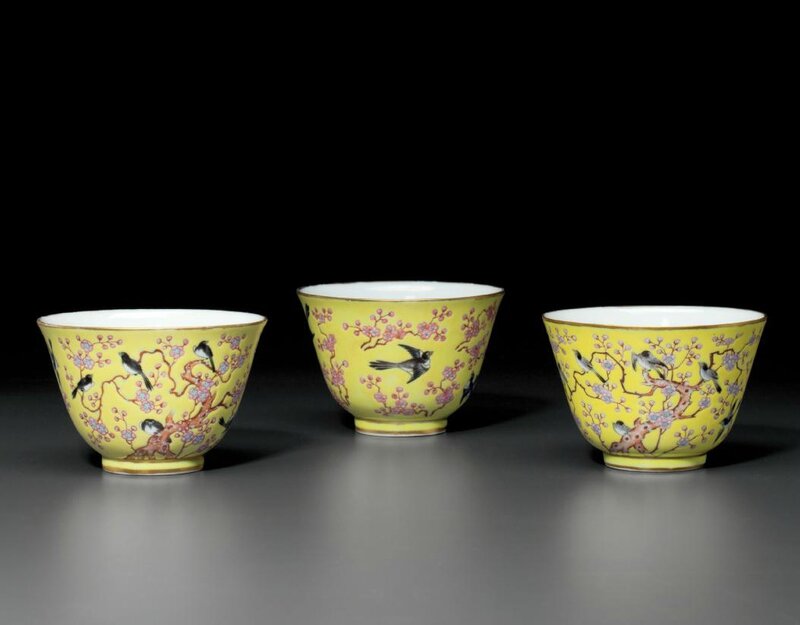 Three famille rose yellow-ground 'Magpie and Prunus' cups, Tongzhi four-character marks in iron red and of the period (1862-1874)