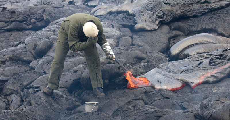 003-Sampling_lava_with_hammer_and_bucket