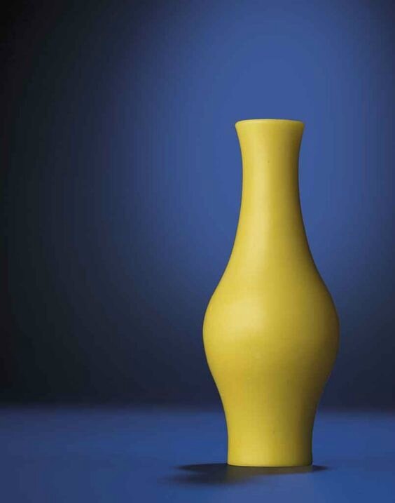 A rare imperial opaque yellow glass vase, Qianlong incised four-character mark within double-squares and of the period (1736-1795)