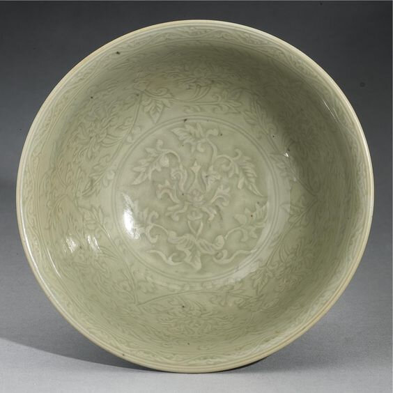 A Finely Carved 'Longquan' Celadon 'Lotus' Bowl, Ming Dynasty, 15th Century