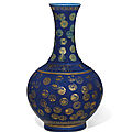 A powder-<b>blue</b>-<b>ground</b> <b>gilt</b>-<b>decorated</b> bottle vase, Guangxu six-character mark and of the period (1875-1908)