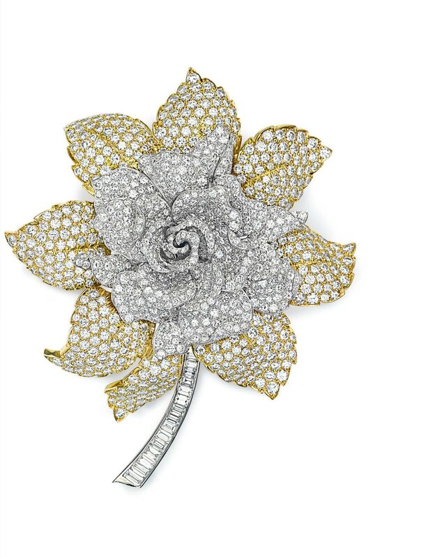 A diamond and gold flower brooch, by David Webb