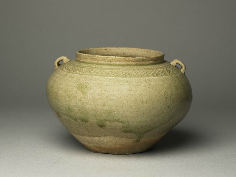 Greenware guan, or jar, with loop handles, Yue kiln-sites, l6th - 7th century AD