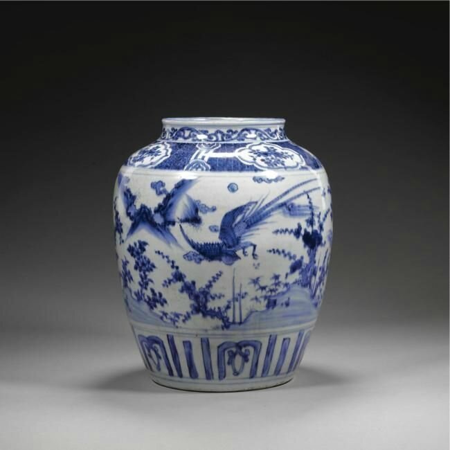 A Large Blue And White Jar