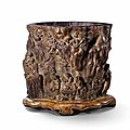 A large carved <b>aloeswood</b> brush pot, Qing dynasty, 18th century