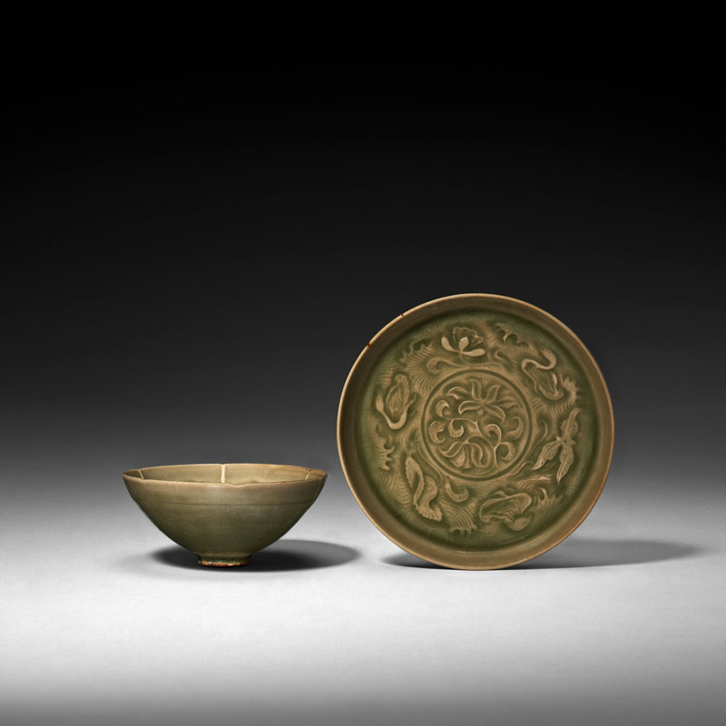A molded Yaozhou celadon 'duck and lotus' bowl and a saucer, Northern Song dynasty, 11th-12th century