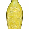 A carved yellow glass snuff bottle, Imperial, probably Palace Workshops, Beijing, <b>1780</b>-<b>1850</b>