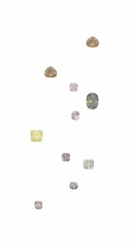 A collection of ten unmounted fancy coloured diamonds