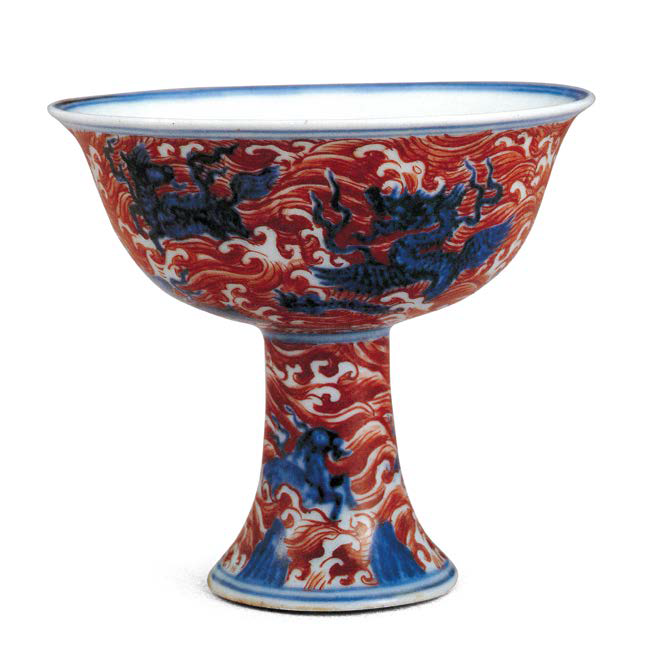 An iron-red decorated blue and white ‘mythical sea creatures’ stem cup, Xuande mark and period (1426-1435), Collection of the National Palace Museum, Taipei