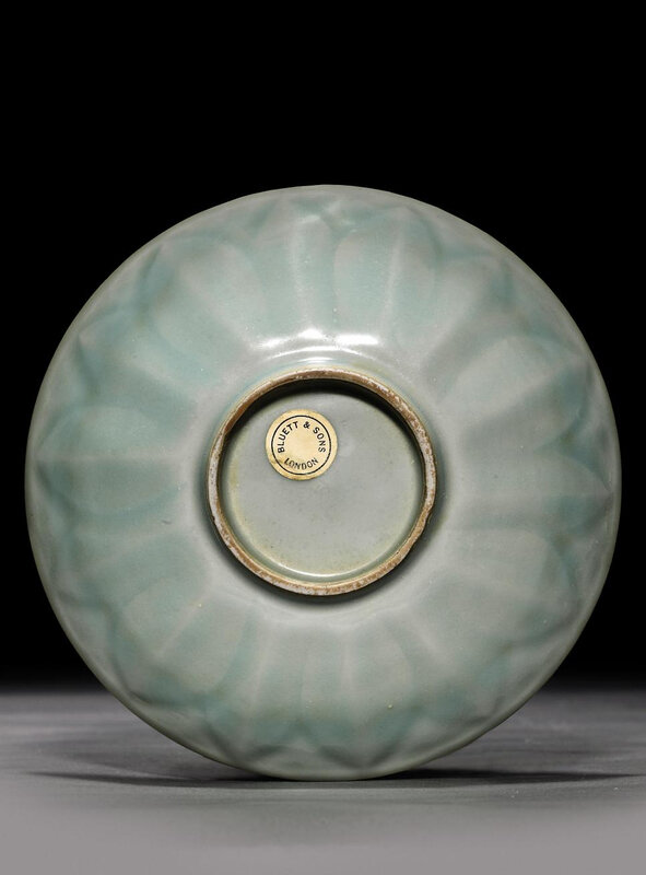 A small moulded Longquan celadon 'lotus' dish, Southern Song dynasty (1127-1279)