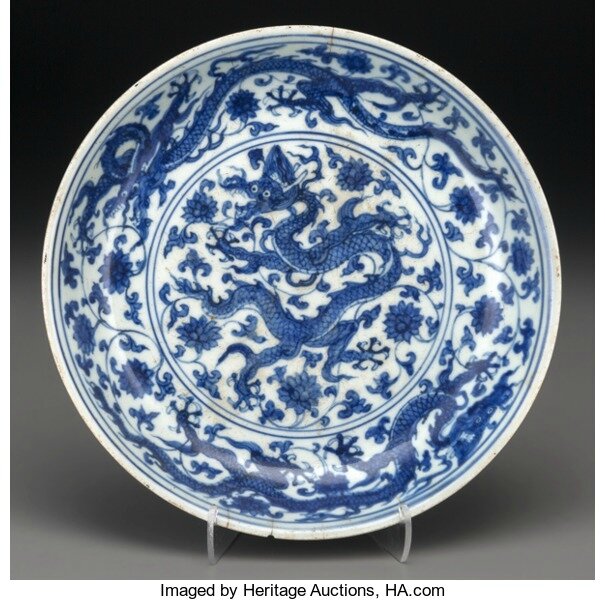 A Rare and Important Chinese Blue and White Dragon Dish, Ming Dynasty, Zhengde mark in underglaze blue within double circles and of the period, circa 1506-1521