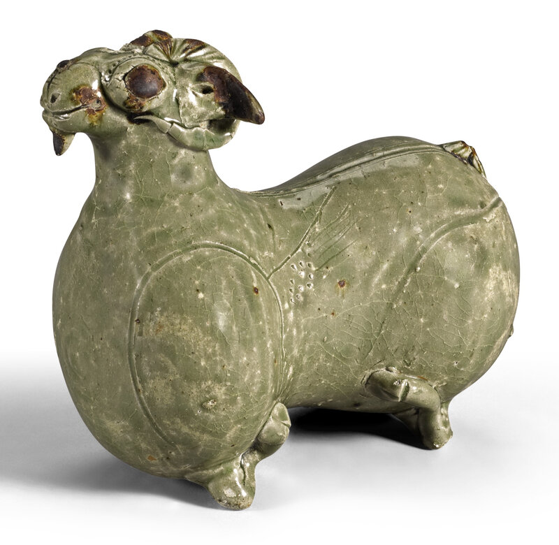 A rare 'Yue' figure of a recumbent ram, Western Jin dynasty, 3rd century AD