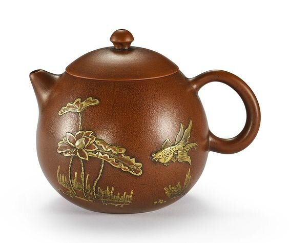 An inscribed Yixing stoneware gilt-lacquer decorated 'goldfish and lotus' teapot and cover, Qing dynasty, late 18th century