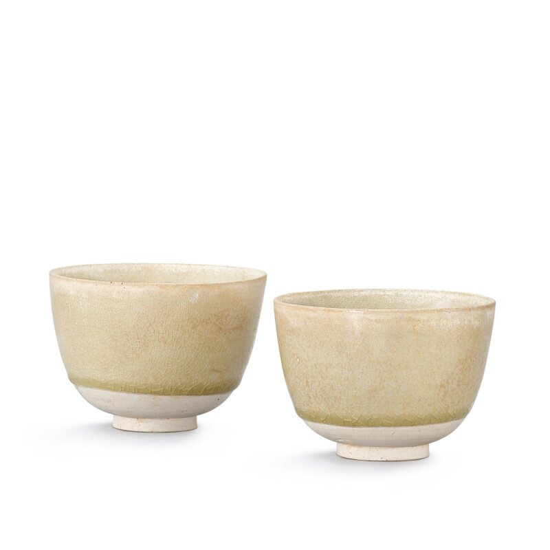 A pair of transparent-glazed whiteware cups, Sui - Tang dynasty