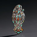 A turquoise and hardstone inlaid silver bird fitting, Eastern Eurasian steppes, <b>2nd</b>-<b>4th</b> <b>century</b> AD