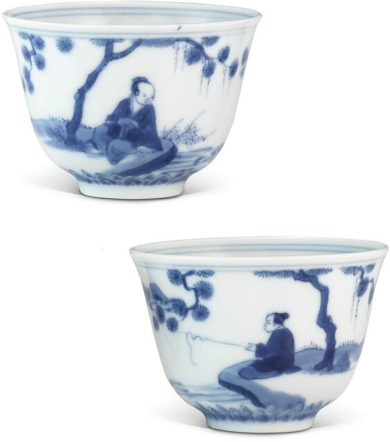 A pair of blue and white 'Scholars' cups, Qing dynasty, Kangxi period (1662-1722)