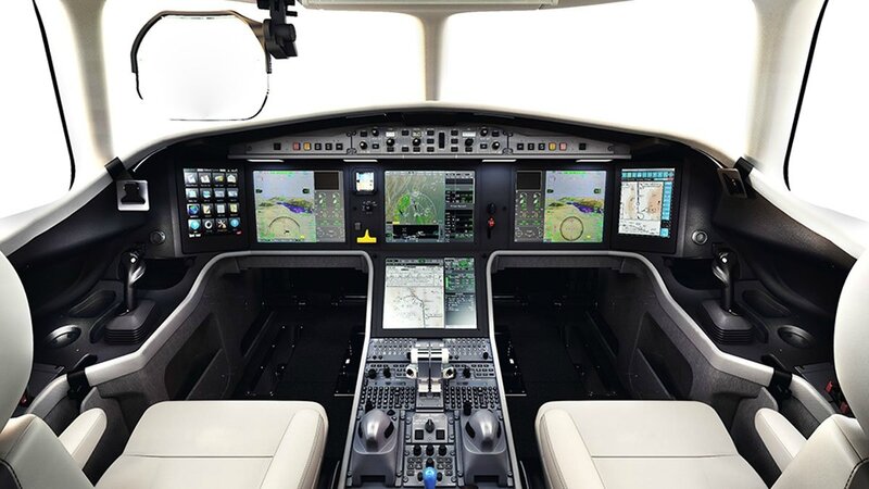 in-the-cockpit-big-windshields-let-pilot-see-both-wingtips-helpful-for-maneuvering-on-the-ground-the-5x-can-be-equipped-with-dual-head-up-displays-and-a-new-radar-from-honeywell-provides-more-detailed-information-on-thunderstorms-from-farther-away