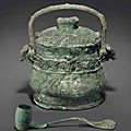 A bronze ritual wine vessel and cover, you, and a bronze ritual wine <b>ladle</b>, Western Zhou dynasty (circa 1046-771 BC)