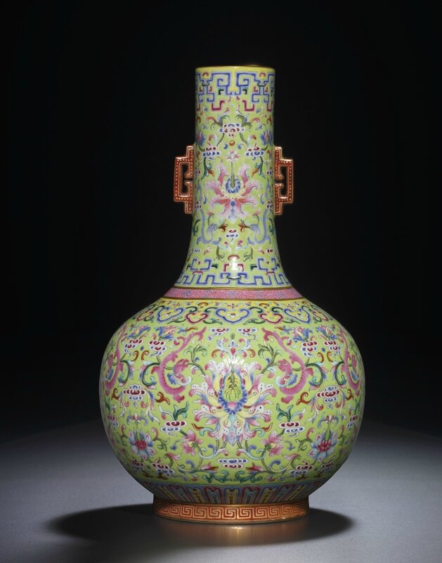 A fine lime-green ground famille-rose bottle vase, Jiaqing iron red six-character seal mark and of the period (1796-1820)