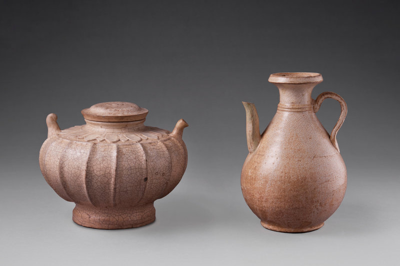 A crackle glaze stoneware ewer and cover and a crackle glaze stoneware ewer, Vietnam, 11th-13th century