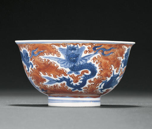 A very rare late Ming iron-red and underglaze-blue bowl, Wanli six-character mark within double-circles and of the period (1573-1620)