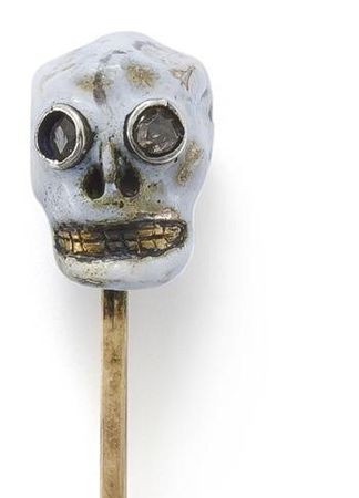 An_early_19th_century_enamel_and_diamond_skull_stick_pin__2_
