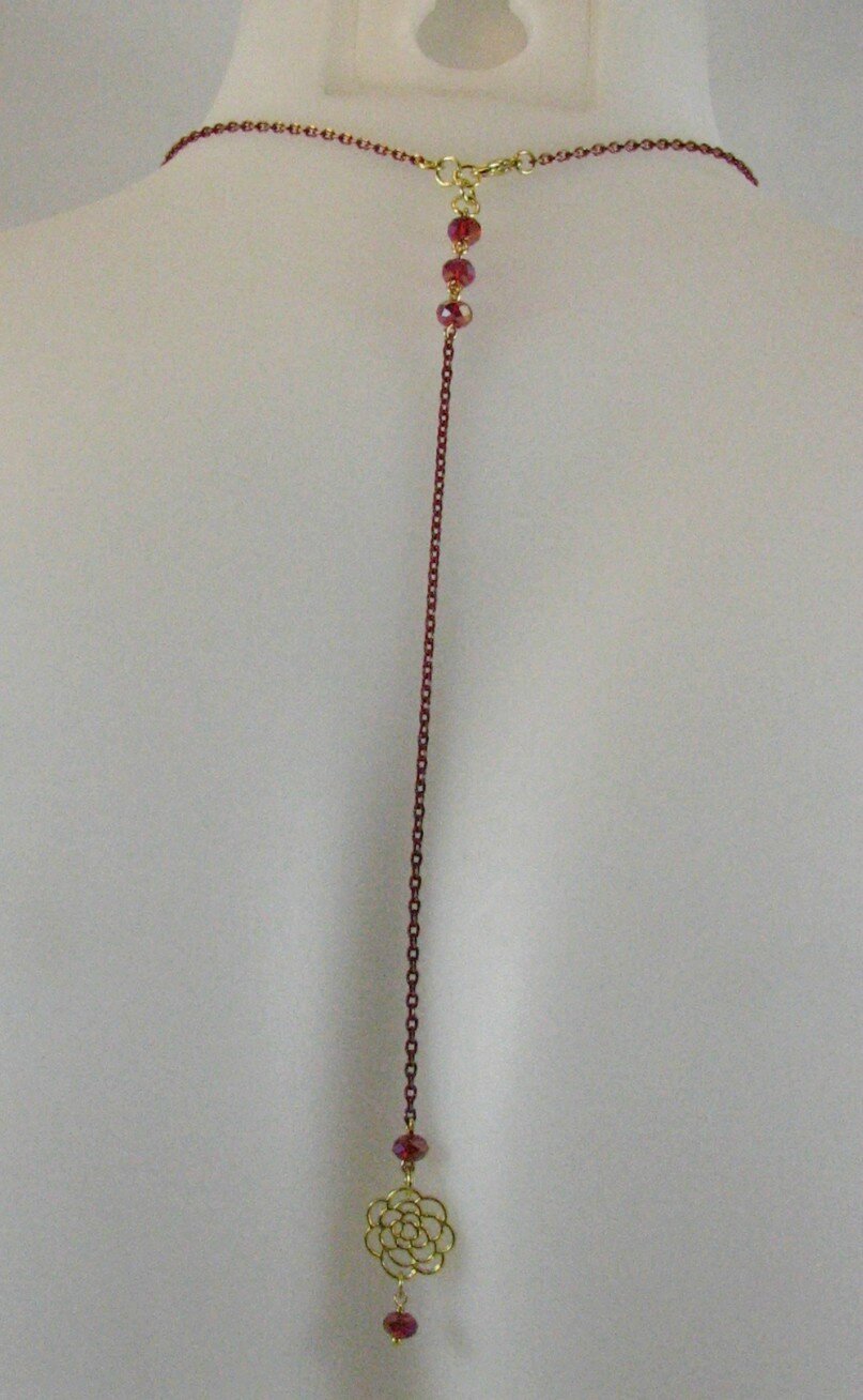 Collier bijou de dos petite fleur
