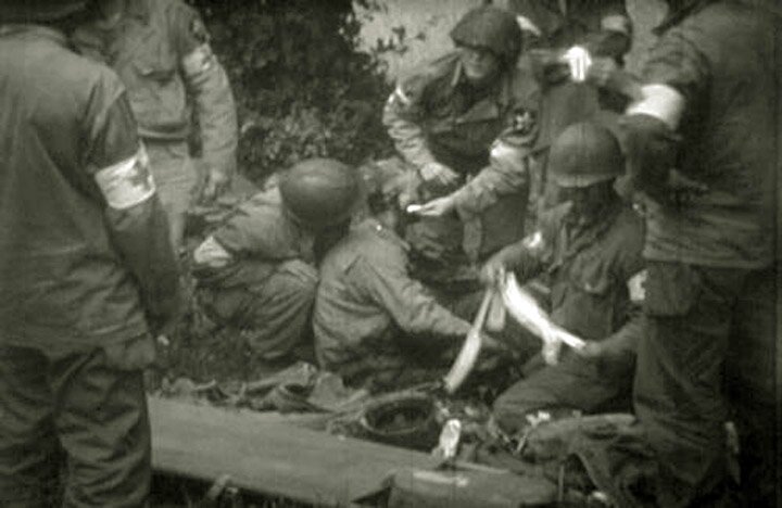 2nd Infantry Division medics caring for wounded comrade