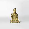An important small gilt-bronze seated figure of Buddha, Korea, Unified Silla period, <b>8th</b> <b>century</b>
