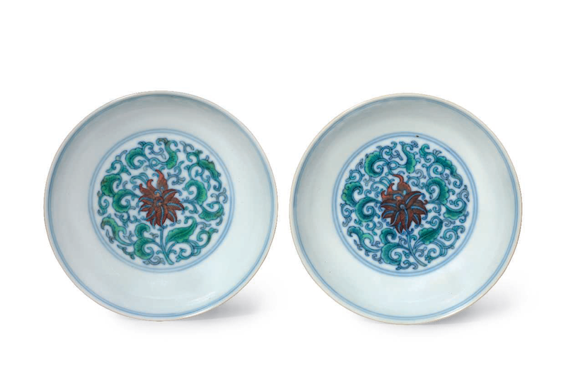 A fine pair of small doucai dishes, Yongzheng six-character marks in underglaze blue within a double circle and of the period (1723-1735)