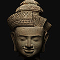 A sandstone head of a male deity, Cambodia, <b>Angkor</b> Period, style of Pre Rup, 10th century