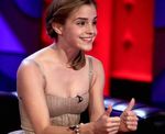 emma_watson_appears_on_friday_night_with_jonathan_ross_wearing_a_nude_mini_dress_and_gold_platforms_9