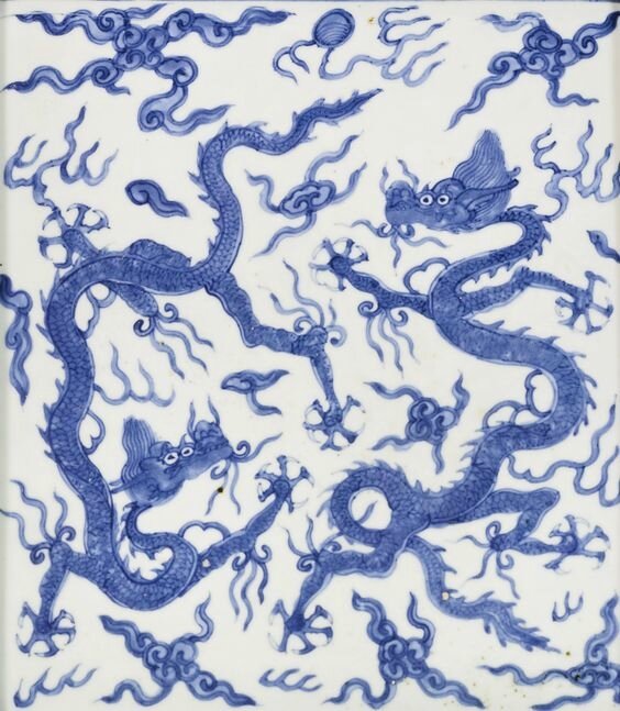 A wood-mounted blue and white ‘dragon’ panel, Ming dynasty, Wanli period