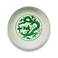 A green-enamelled incised 'dragon' dish, <b>Chenghua</b> <b>six</b>-<b>character</b> <b>mark</b> (1465-1487)