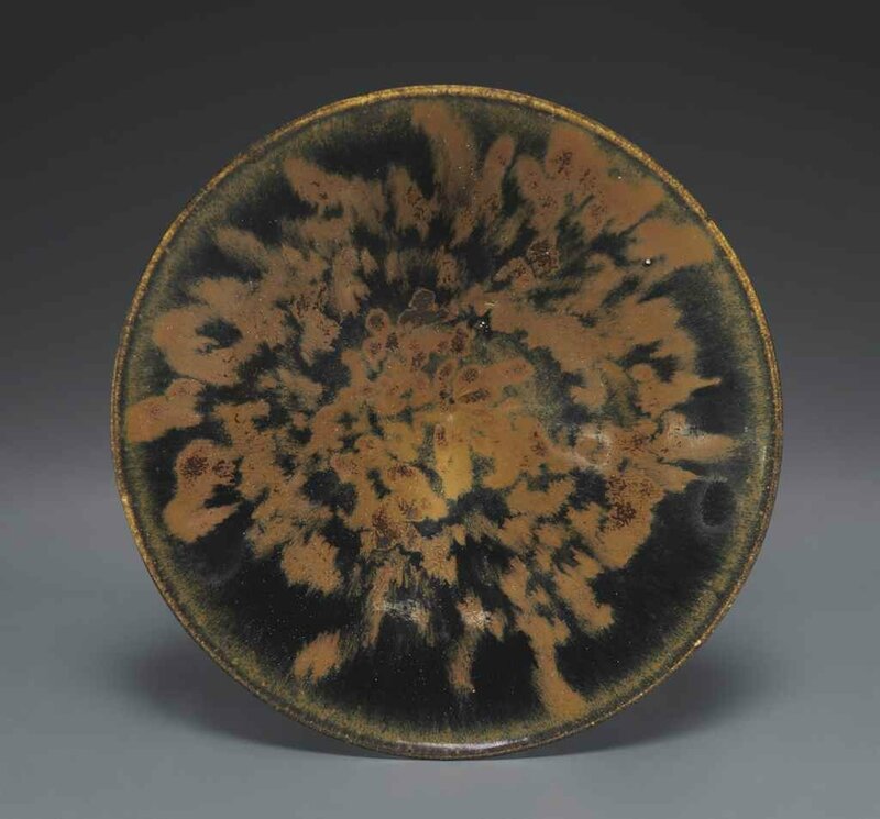 A black-glazed conical bowl with russet 'partridge feather mottles', Northern Song-Jin dynasty, 11th-12th century