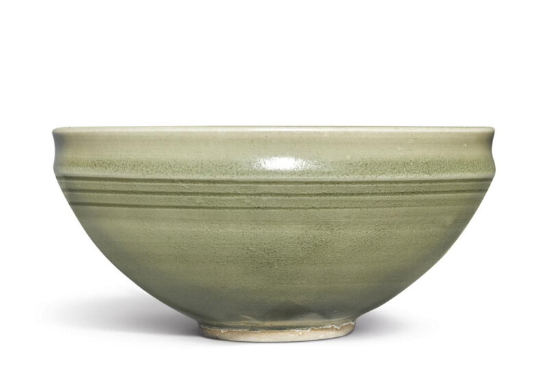 A large 'Yaozhou' carved 'wave' deep bowl, Jin dynasty (1115-1234)