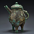 A rare bronze ritual tripod pouring vessel and cover, he, Late Shang <b>dynasty</b>-<b>early</b> <b>Western</b> <b>Zhou</b> <b>dynasty</b>, 11th century BC